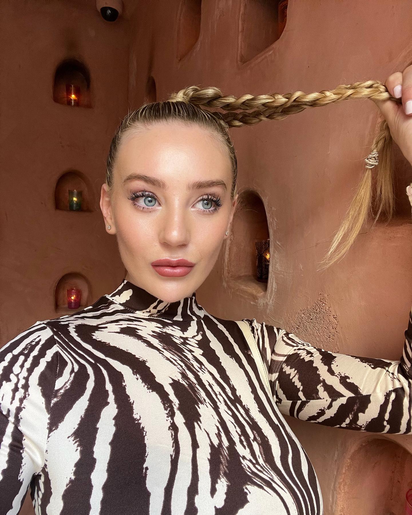 The greatest glory in living lies not in never falling 